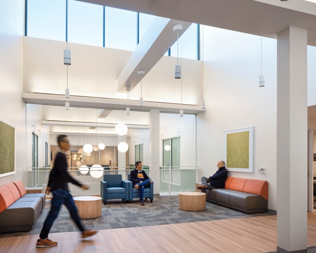 Modern lobby with high ceilings and ample natural light