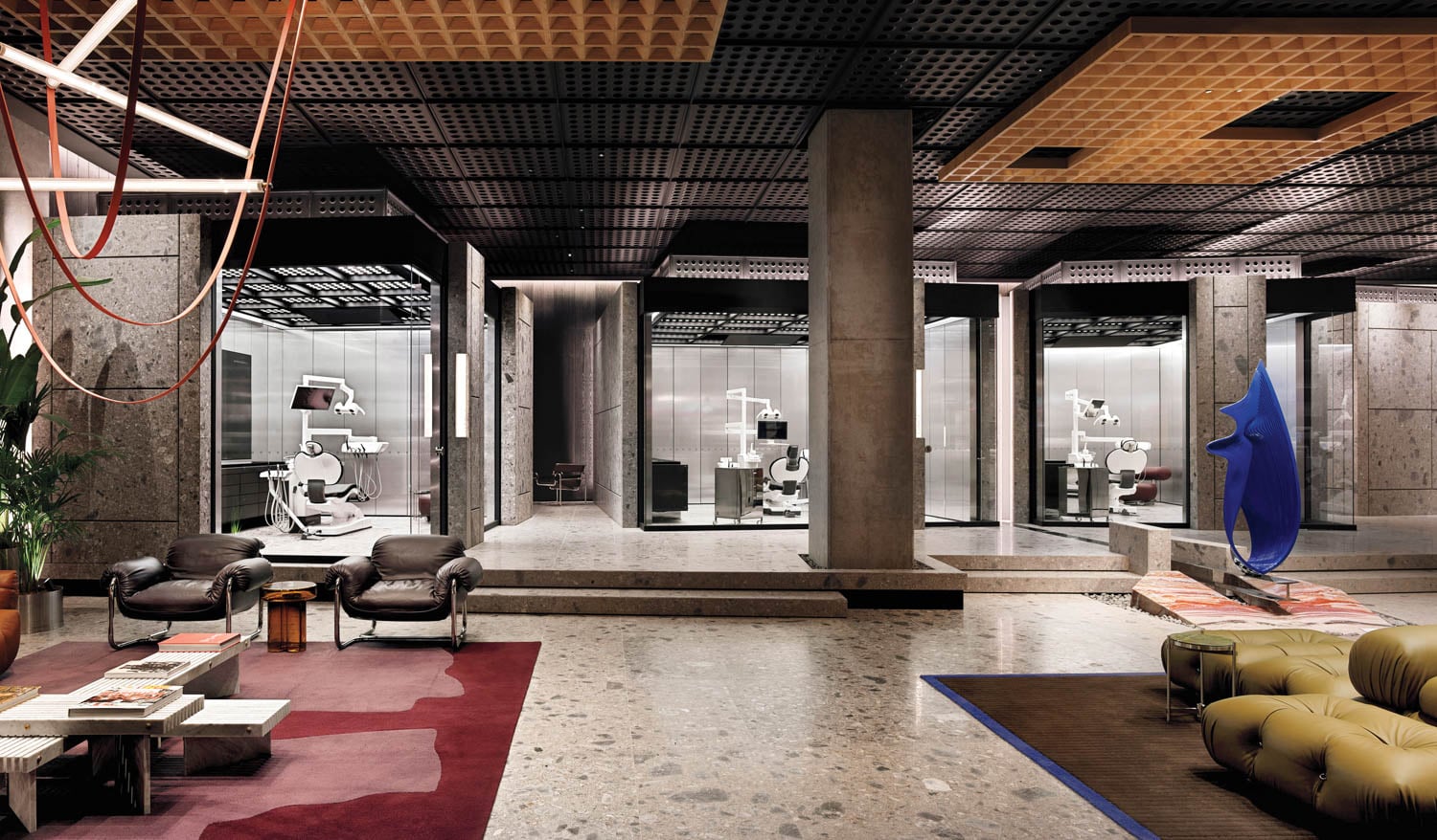 Modern office with sleek glass partitions and minimalist decor