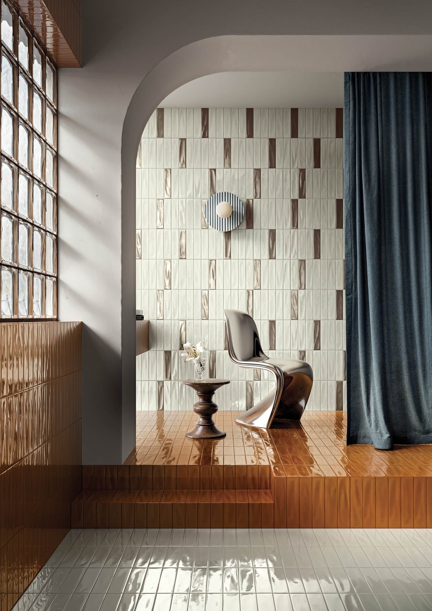 blue curtain against tile wall