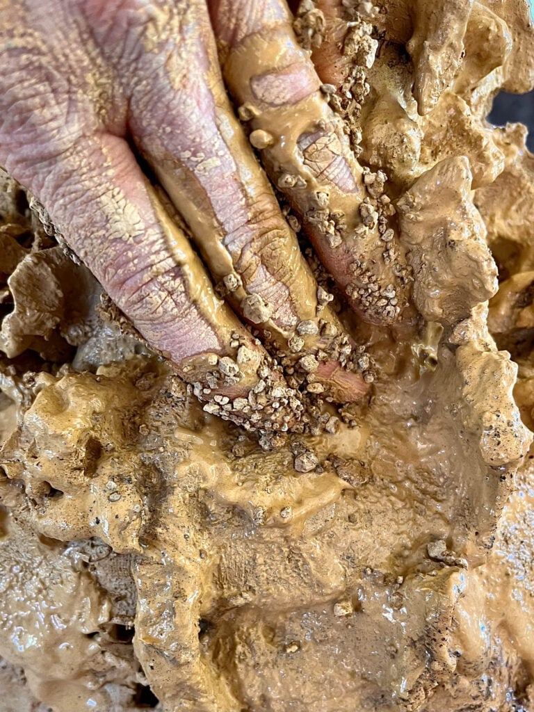 hand with clay