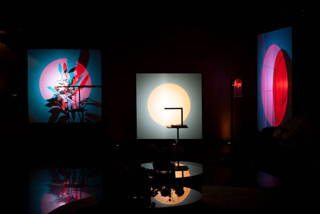 lit artwork in a dark room