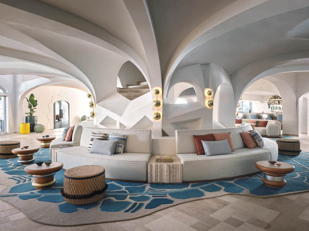 lobby with white wraparound sofa