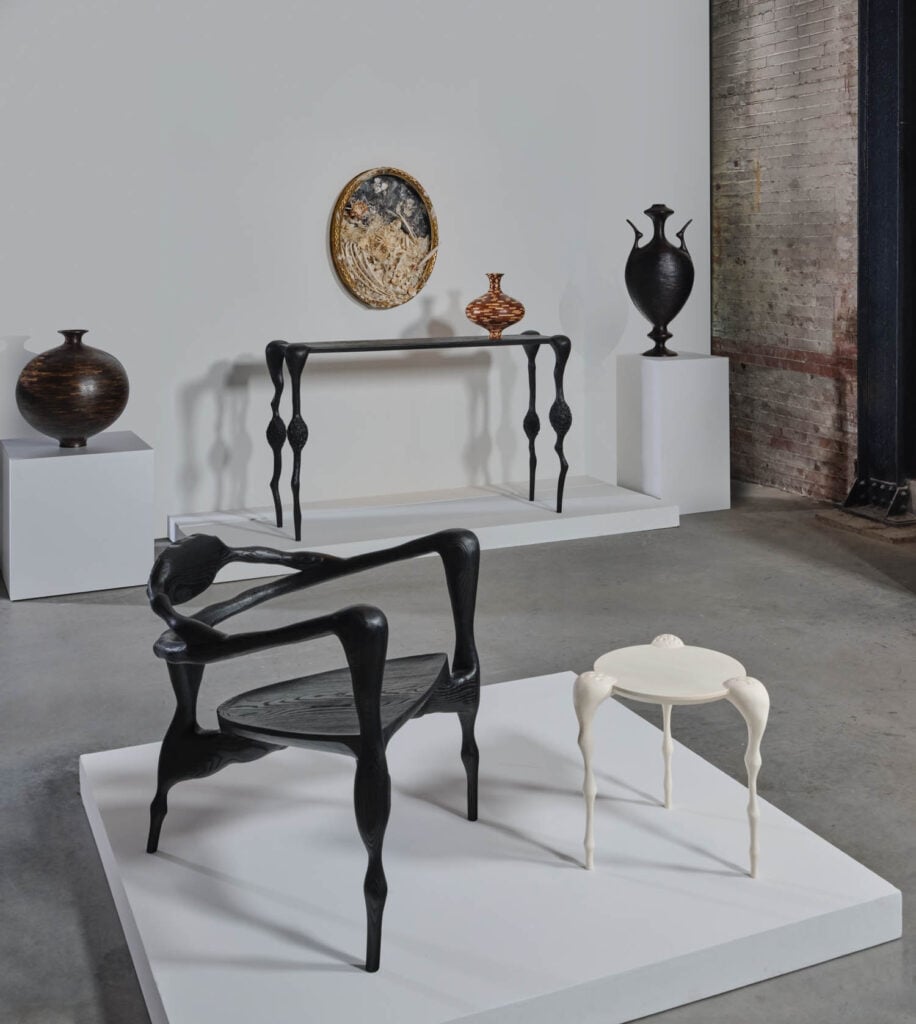 black chair and white side table