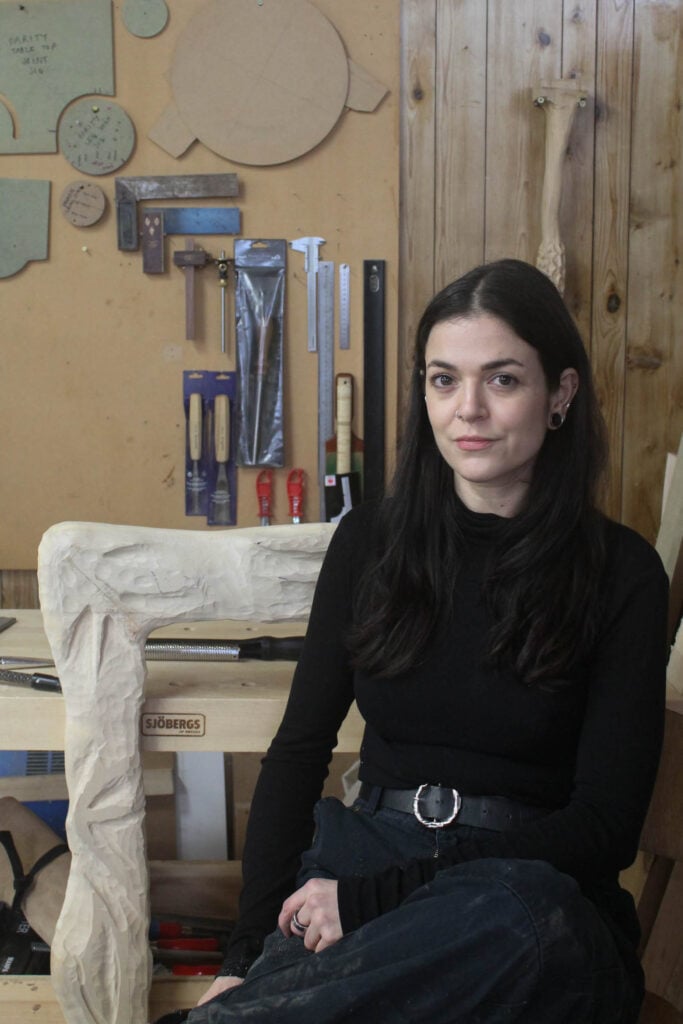 sofia karakatsanis in a black outfit