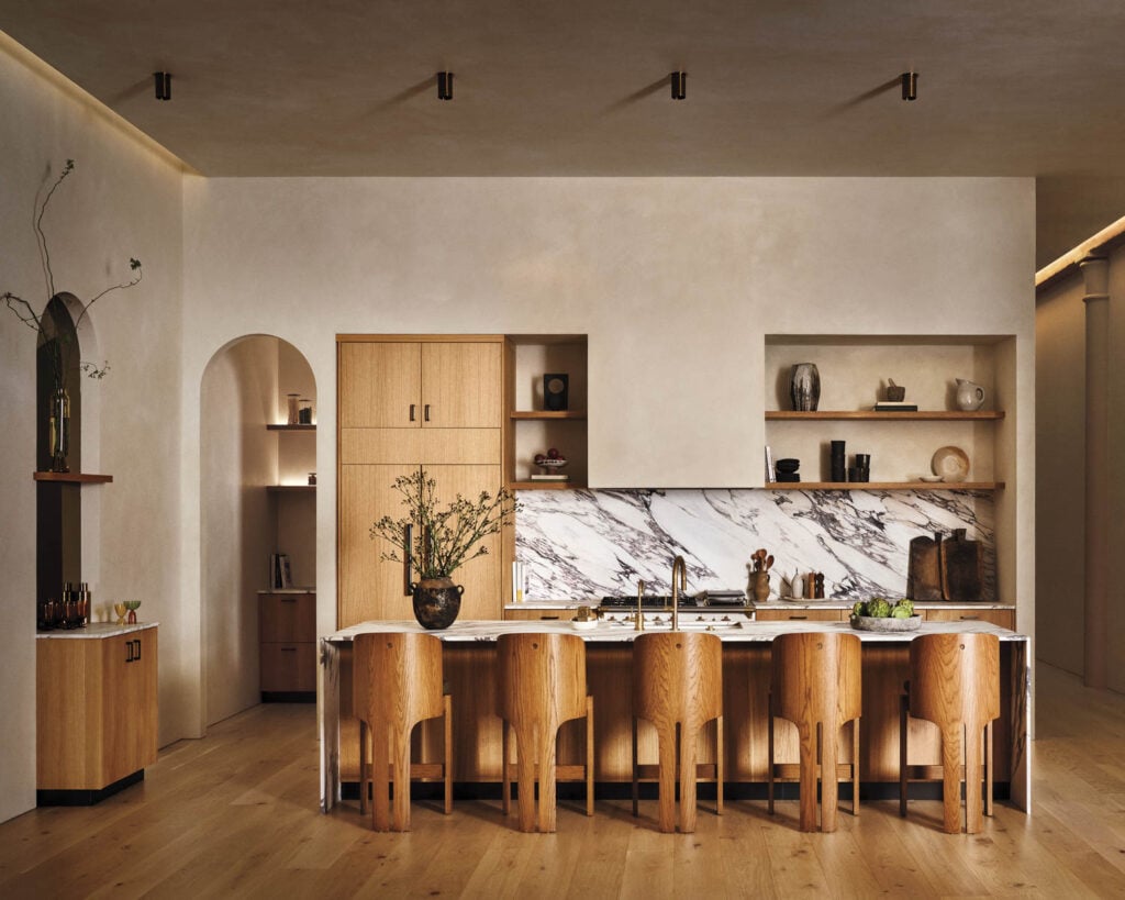 a light-filled kitchen with dining table