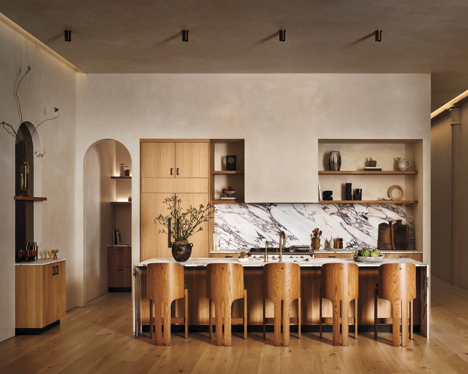 a light-filled kitchen with dining table