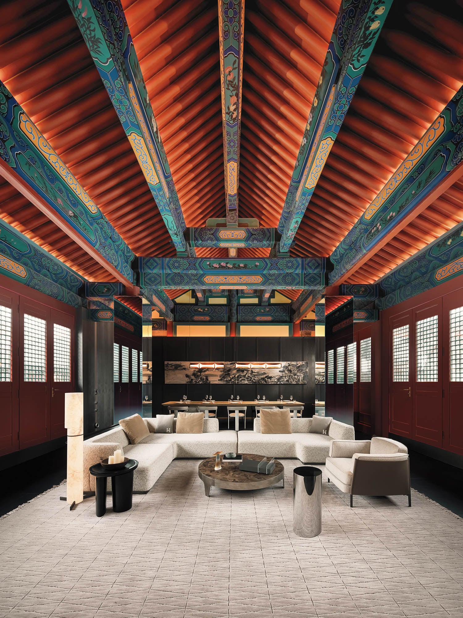 dramatic pitched ceiling over white couch