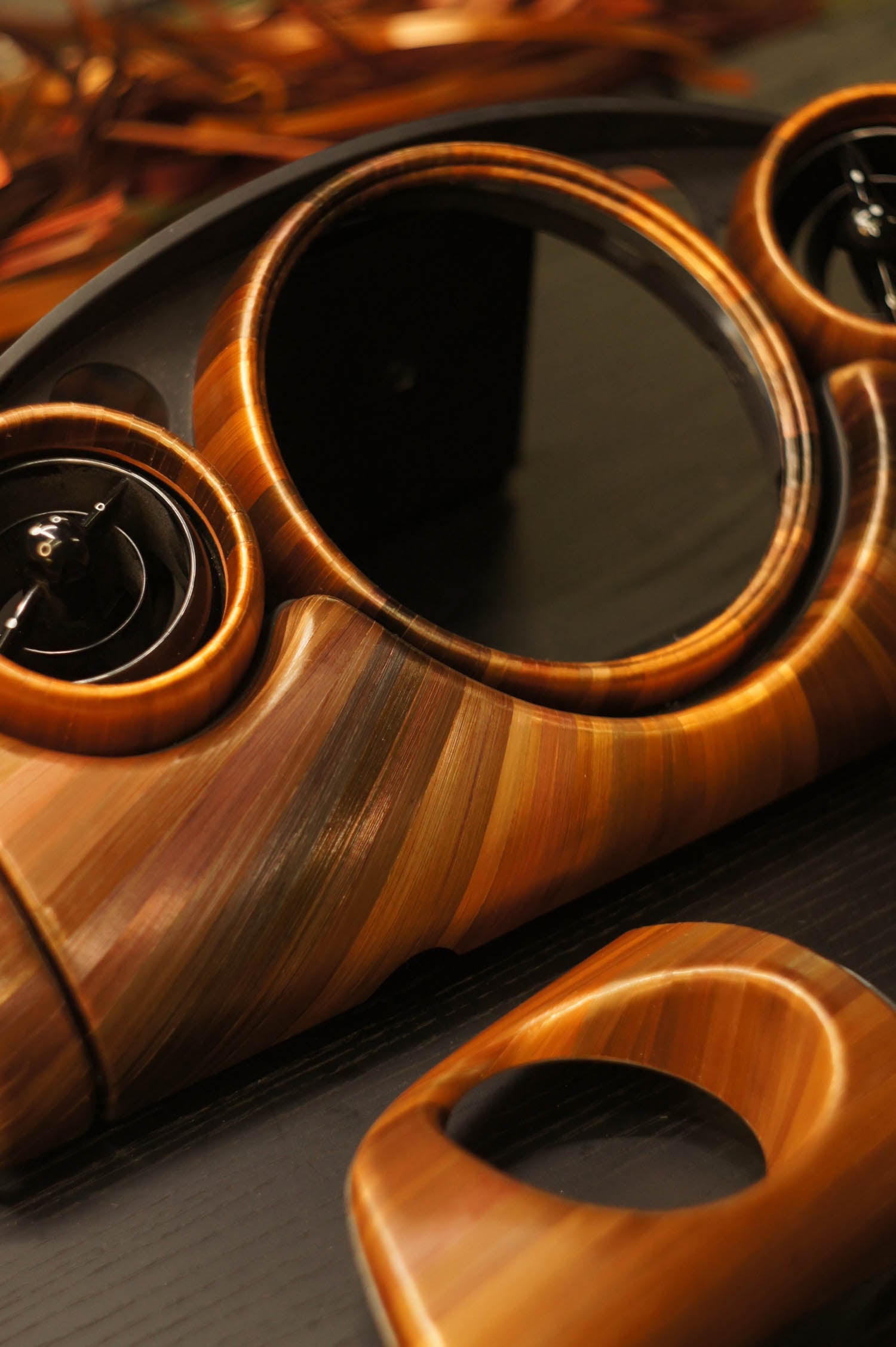 closeup of dashboard made of straw-marquetry