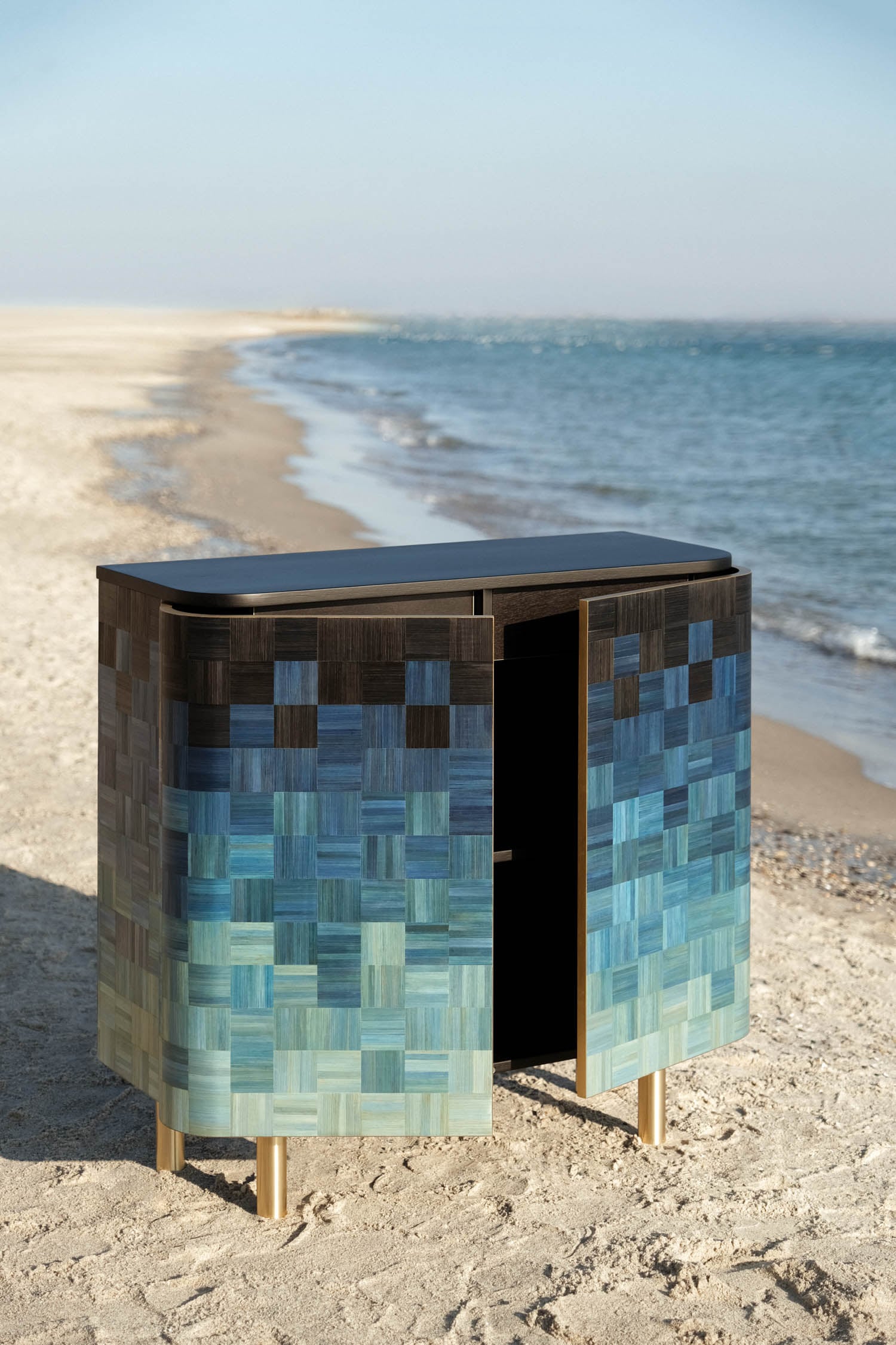 blue ombre cabinet on the beach