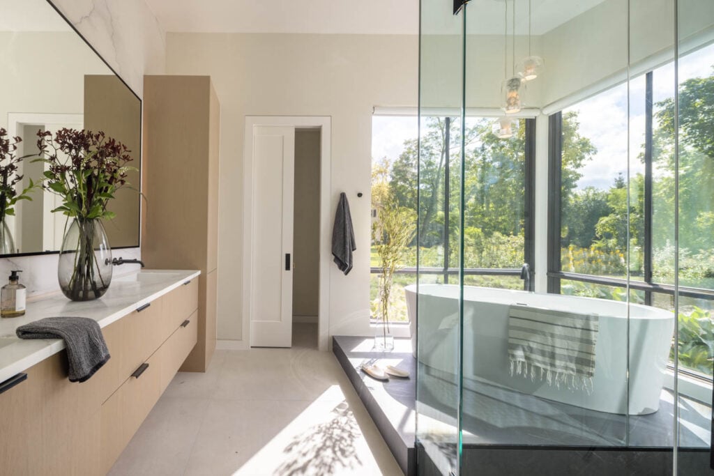 bathroom with white freestanding tub