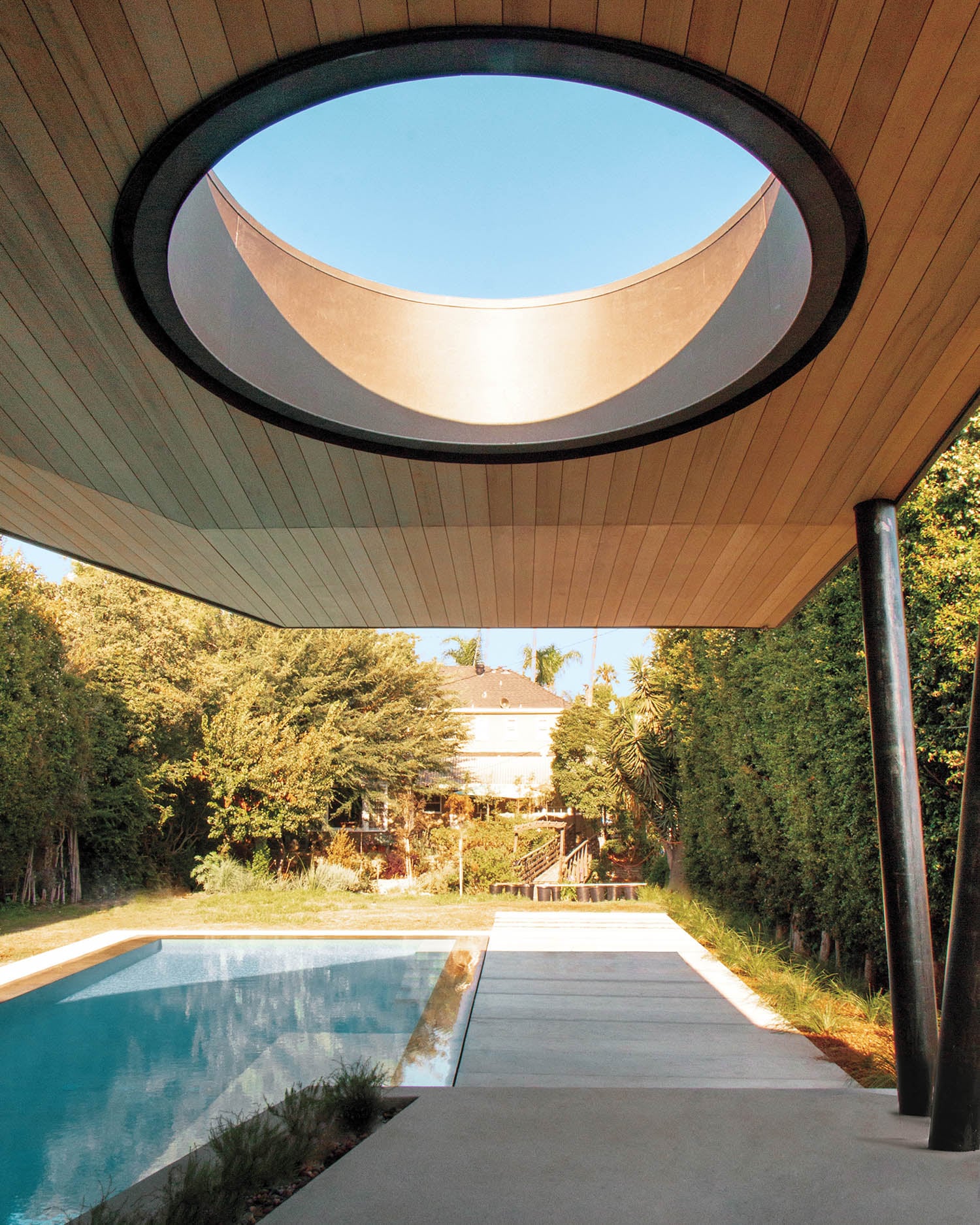 shady area with a circular cutout on roof