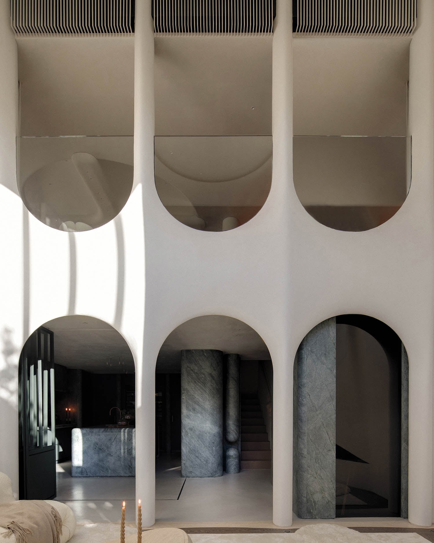 exterior facade of home with arched entryways