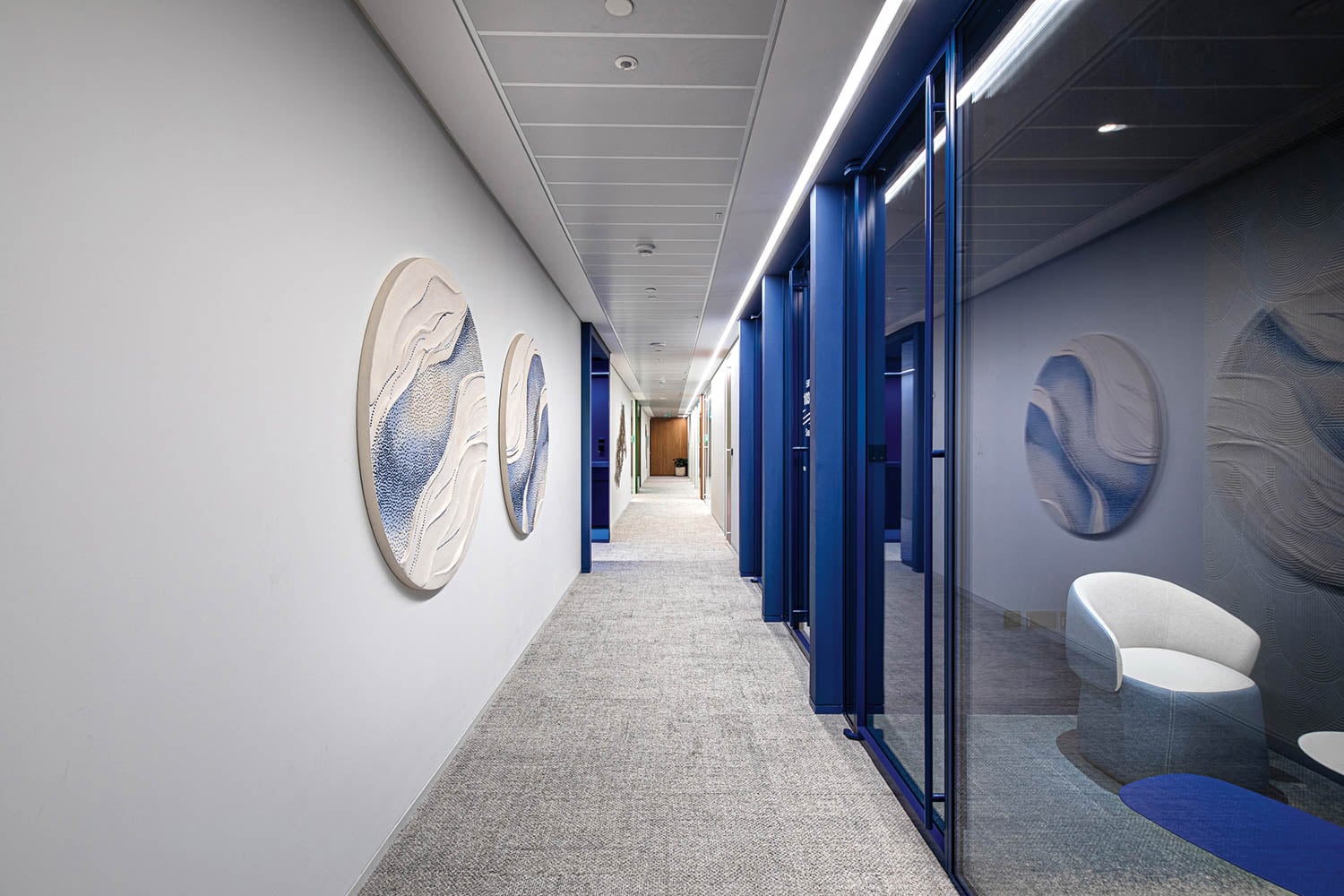 hallway with blue pods
