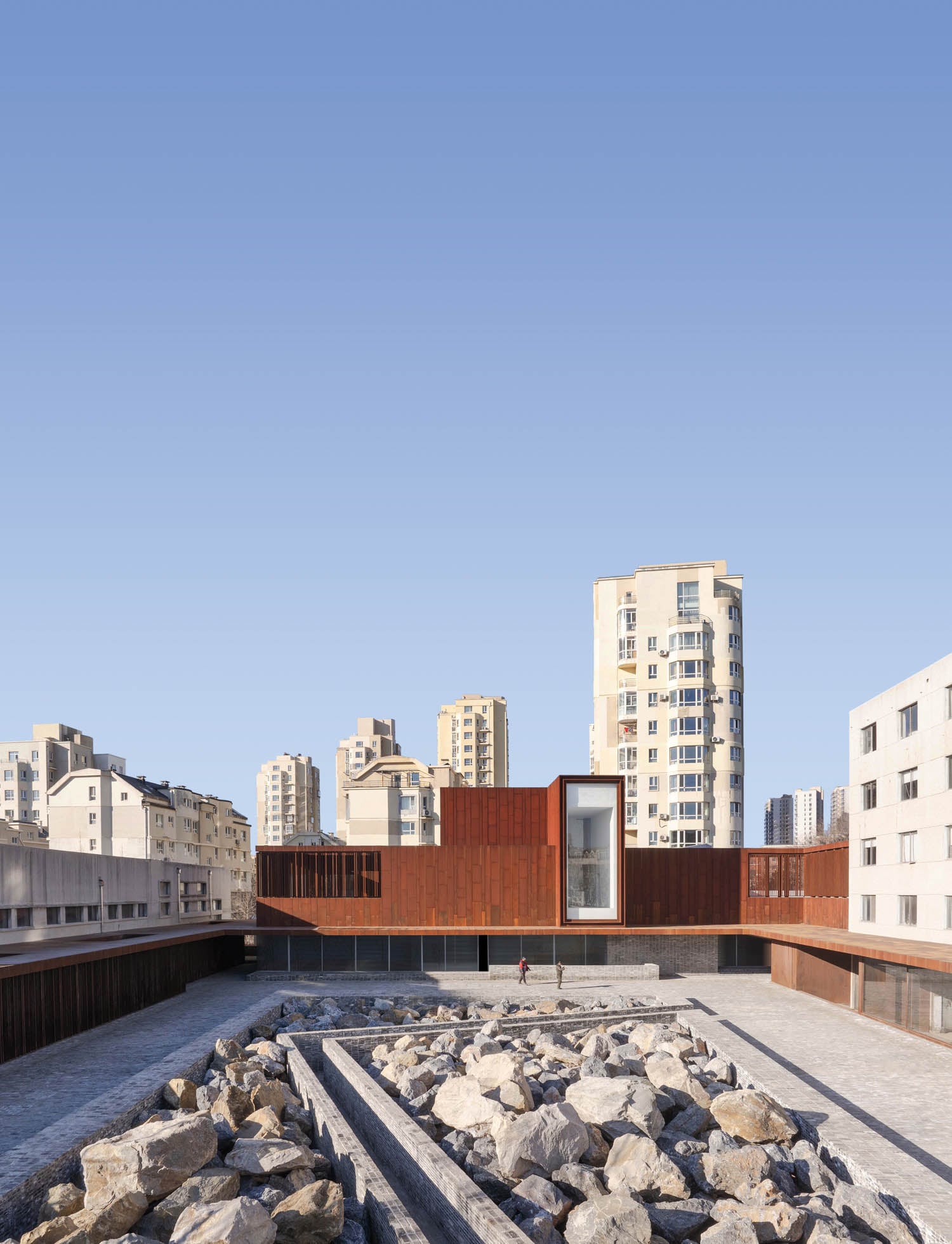 outdoor courtyard with rock garden in corporate office interior design