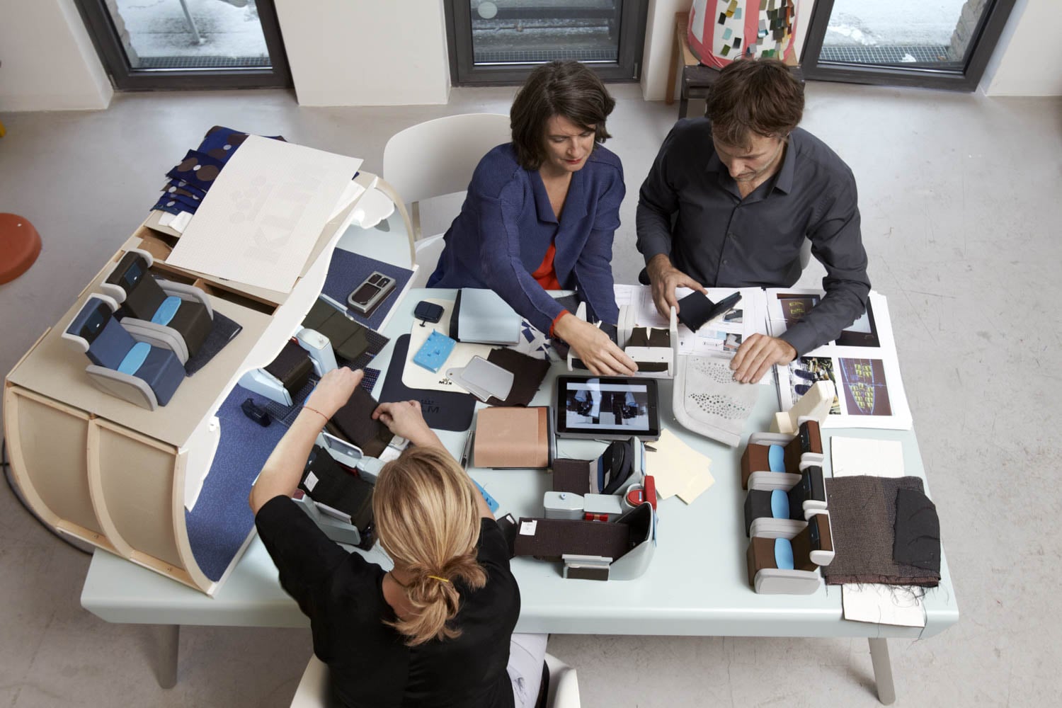 multiple people sitting at table