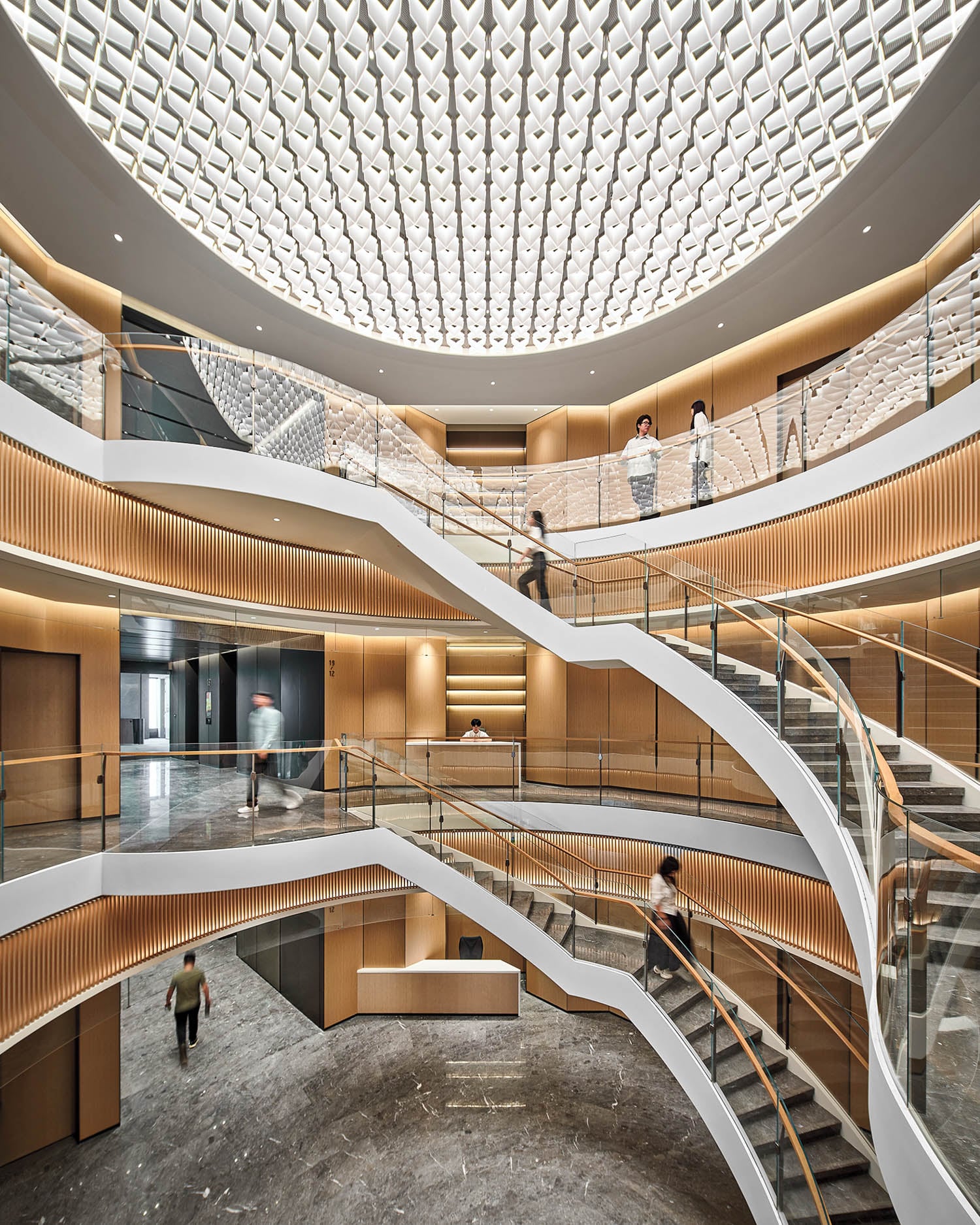 people walking up and down stairs