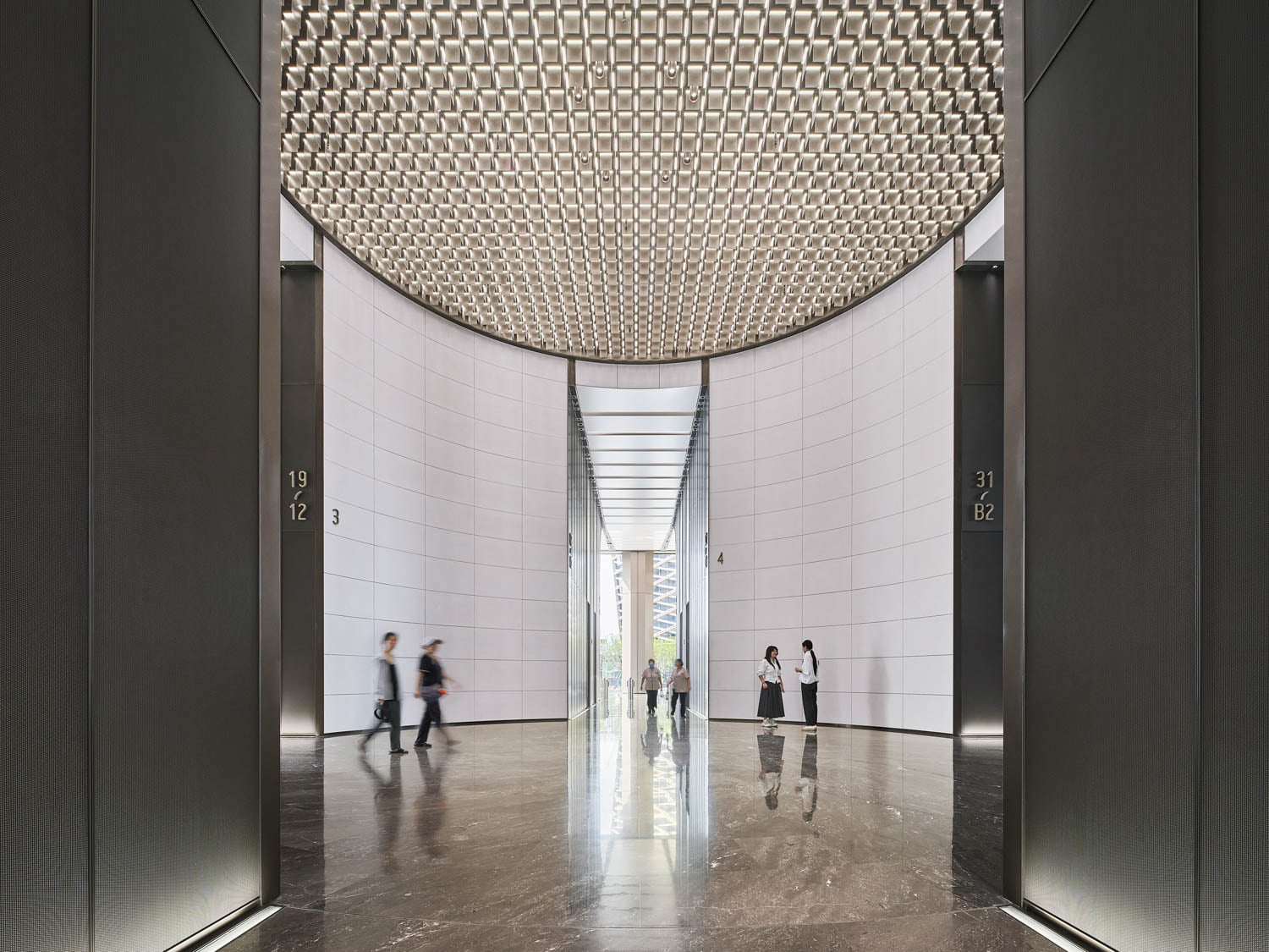 people walking around dome area