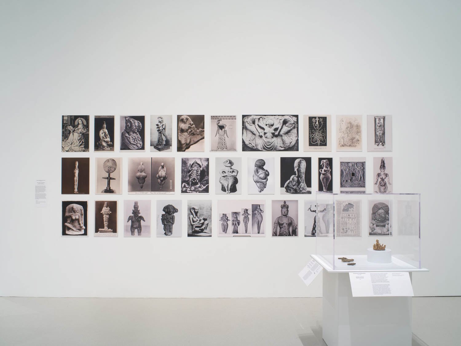 multiple photographs of women on the wall