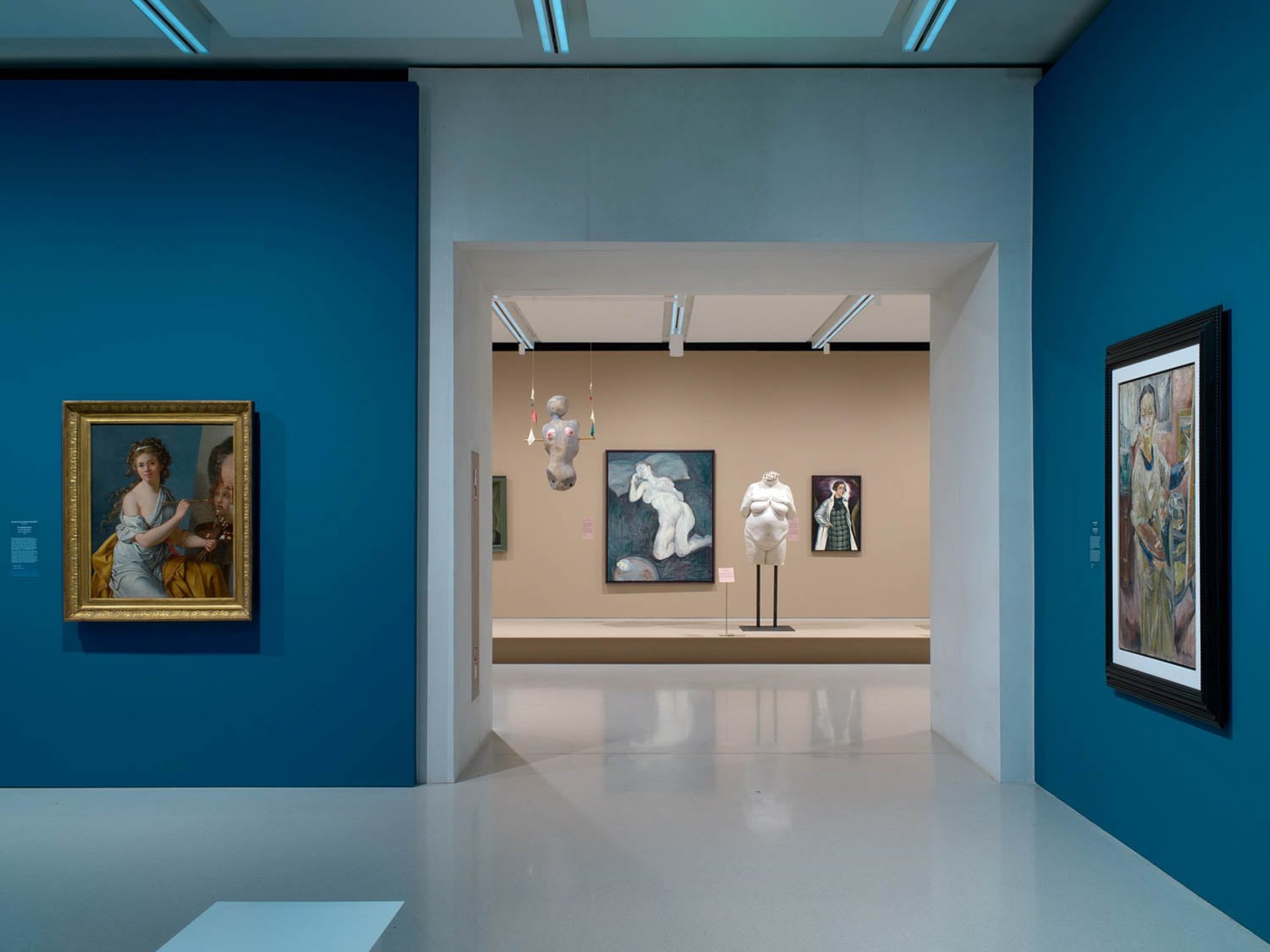 showroom with blue walls and artwork