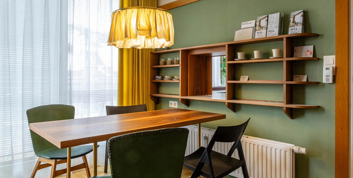 dining area with shelves and lighting