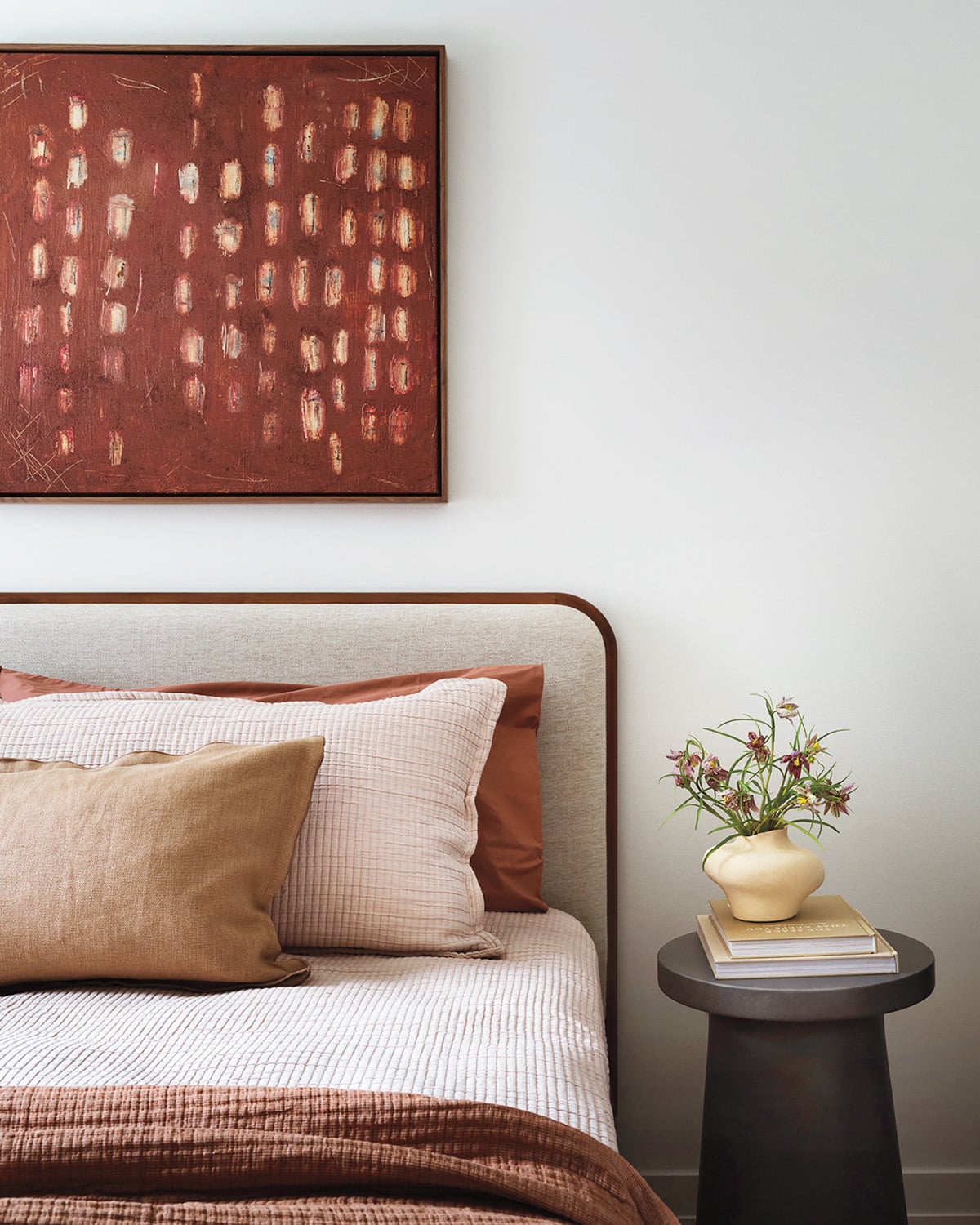 bed with cream pillows