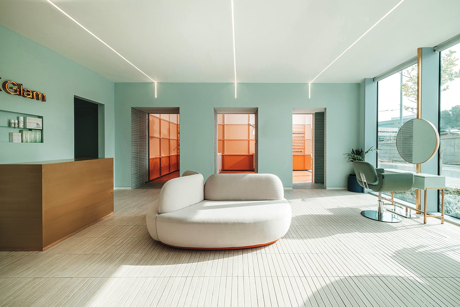 wix office with light green walls and cream seat