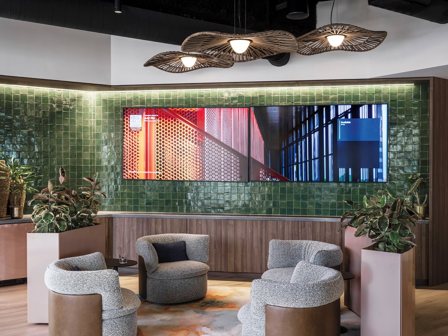 sitting area with gray and cream armchairs in smithgroup office