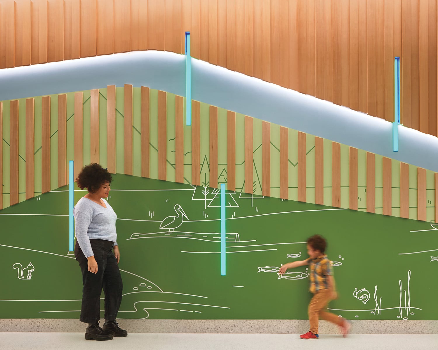 a wall mural with green base and yellow stripes