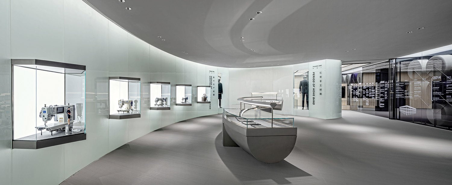 A room with a glass display case and a glass display case.