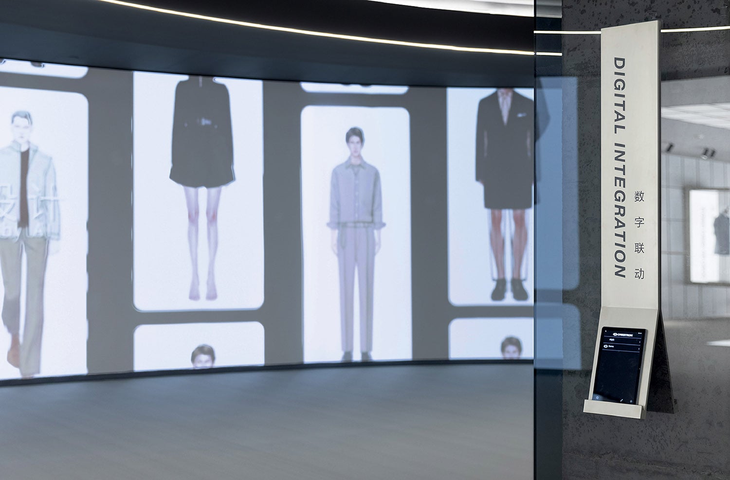 A display of clothes on a wall in a room.