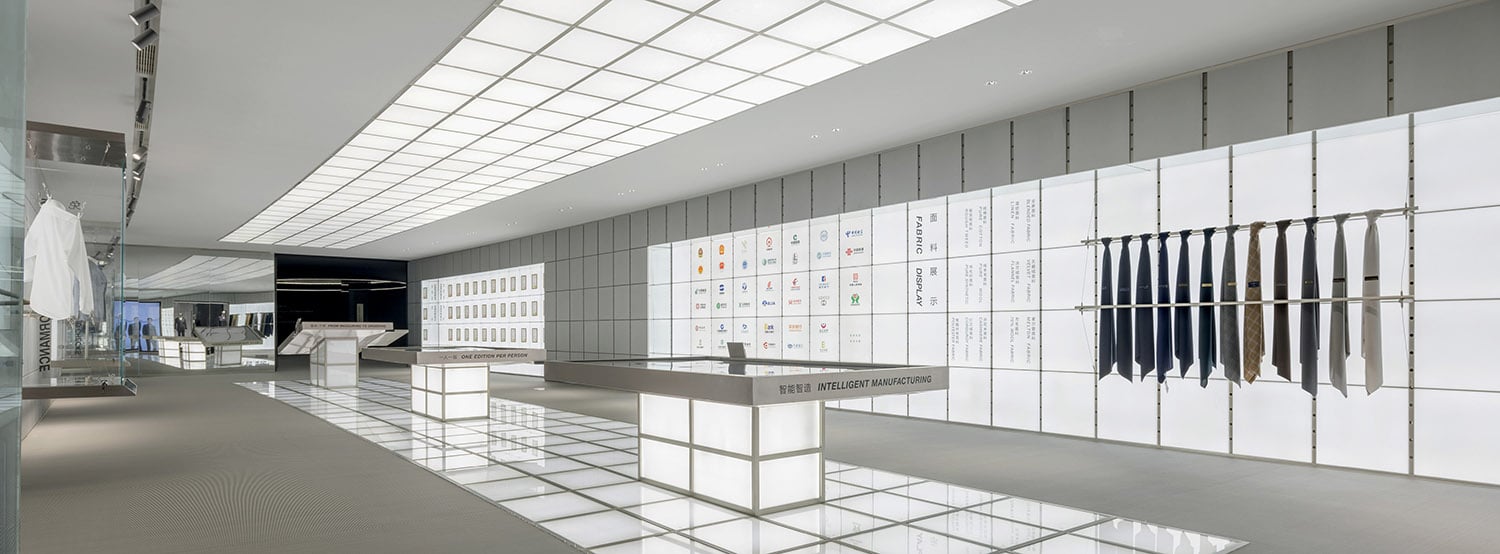 The interior of the new store, with a large display of clothing.