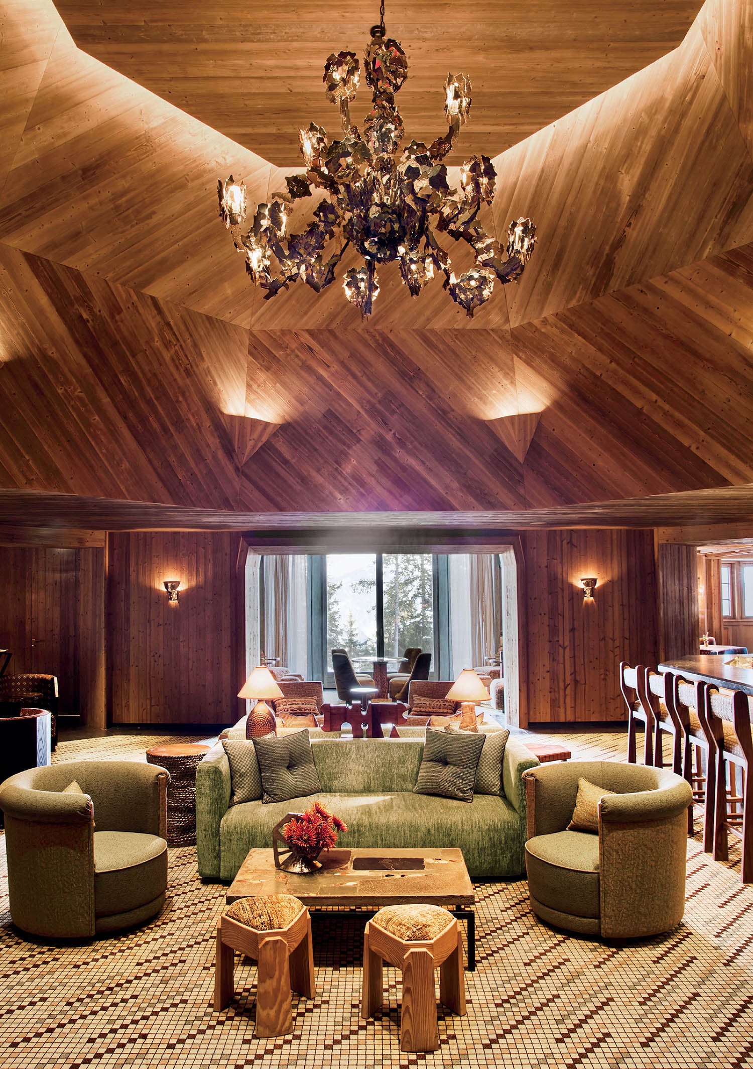 A living room with a large wooden ceiling.