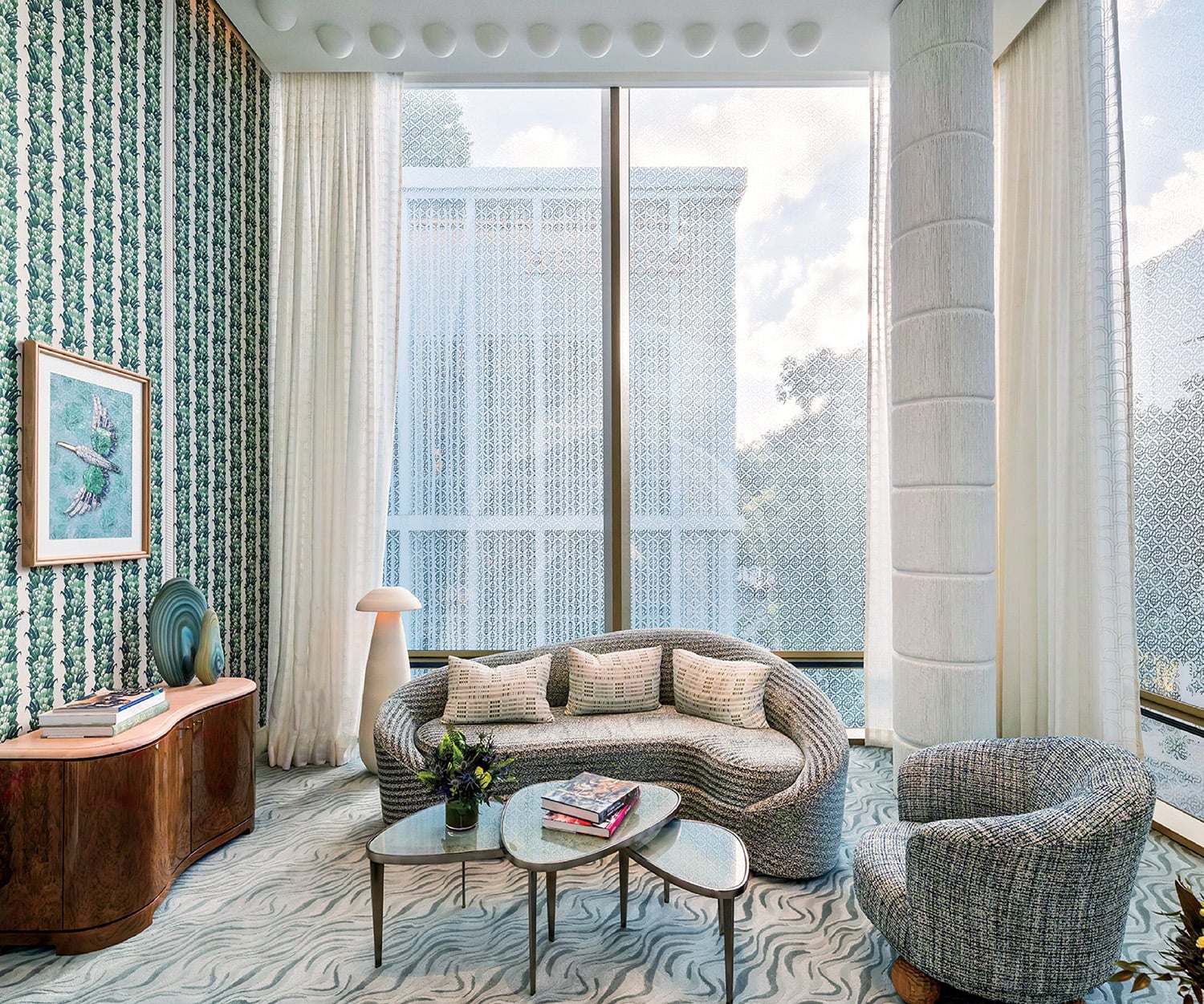 A living room with a couch and a chair