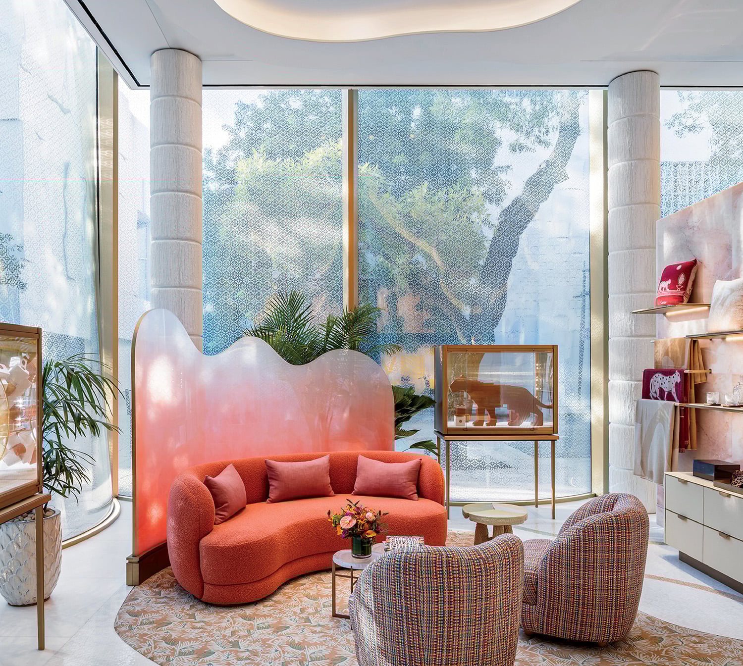 A living room with a large window and a couch