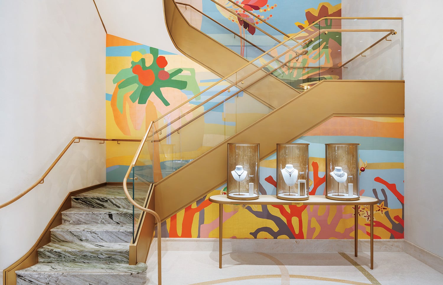 A staircase with a painting on the wall