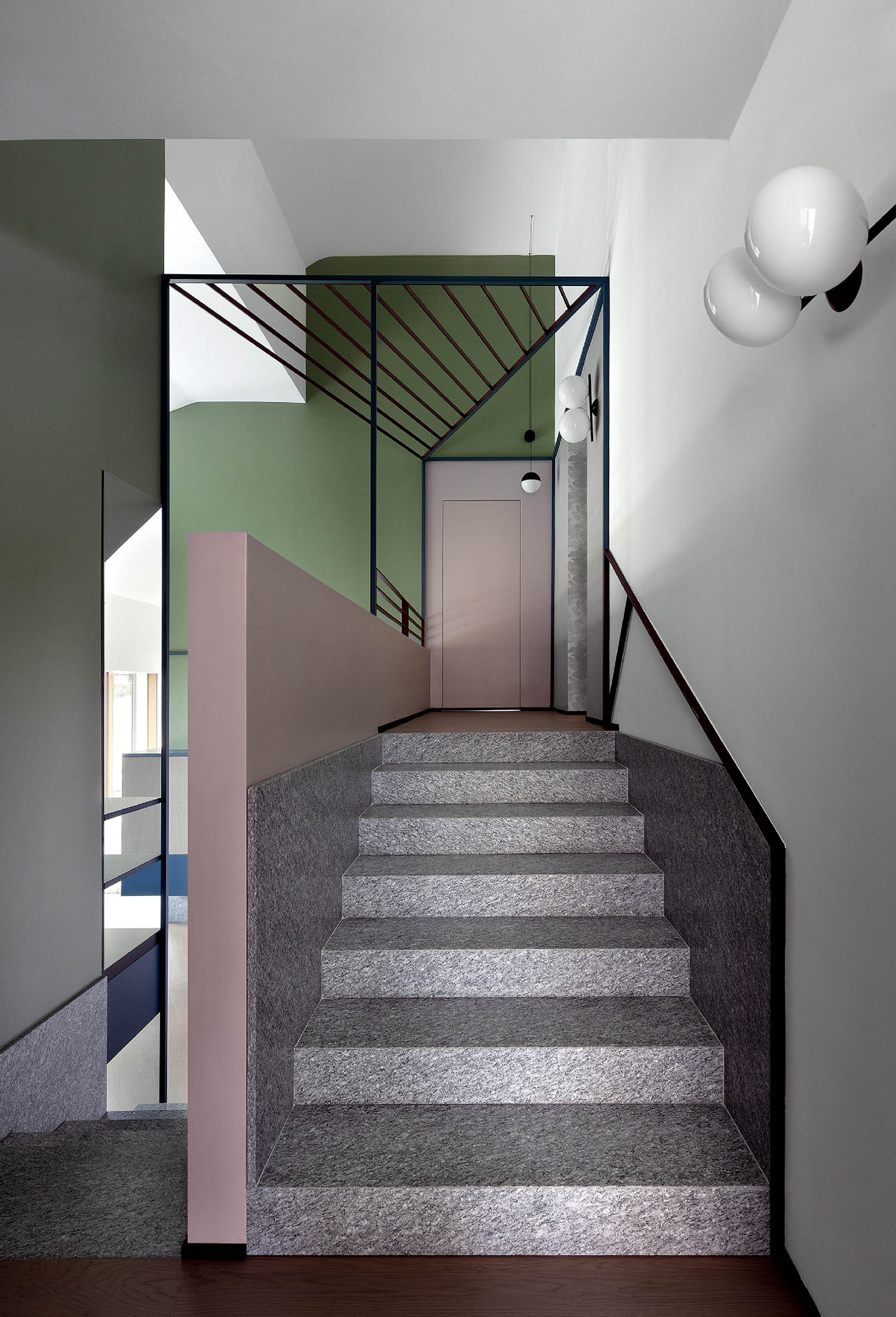 A staircase with a light on the top.