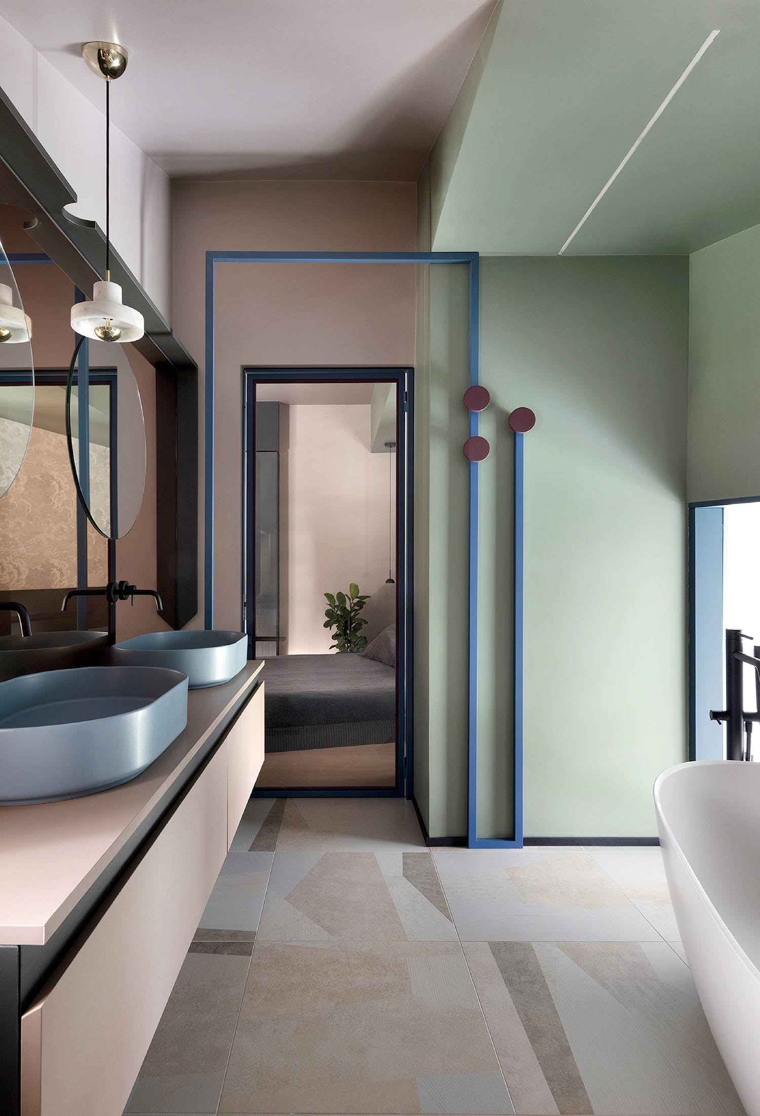 A bathroom with a bathtub and a sink.