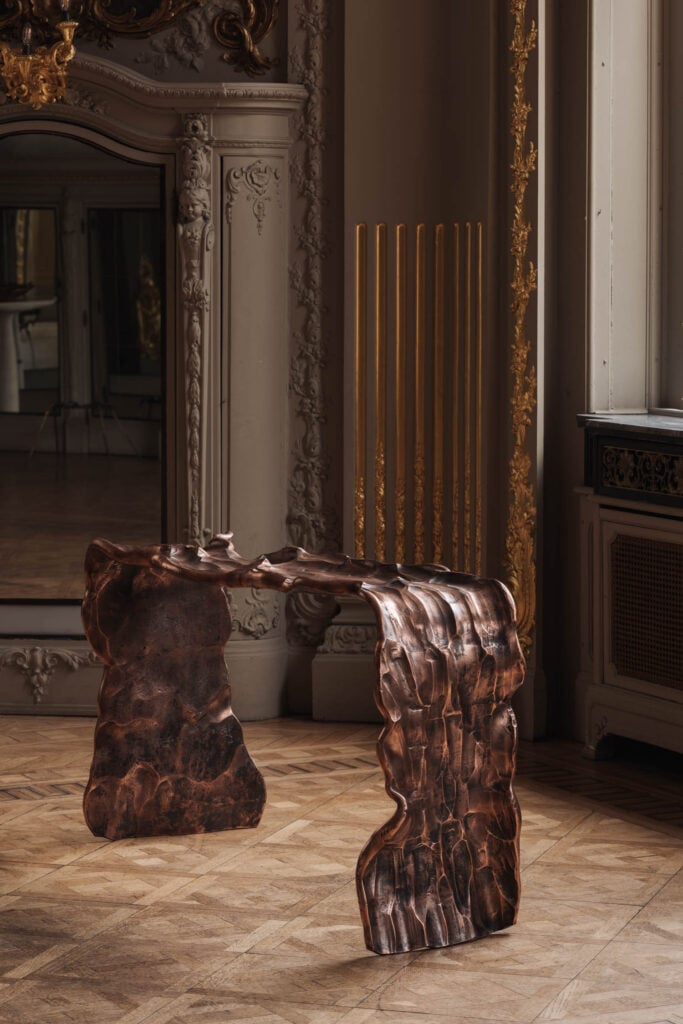 copper bench with fluid aesthetic