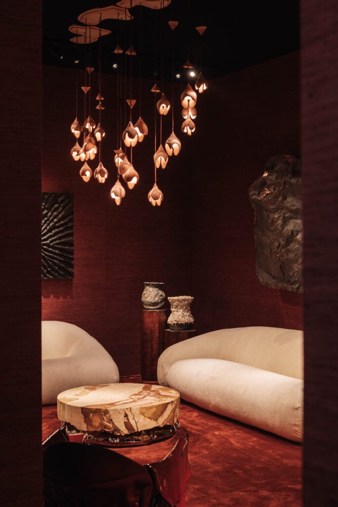 cream couches in red room