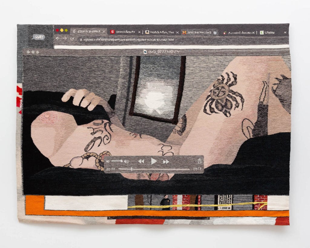 A woven tapestry depicts a reclining tattooed nude figure on a bed, framed by a web browser and video player interface at the top and bottom.