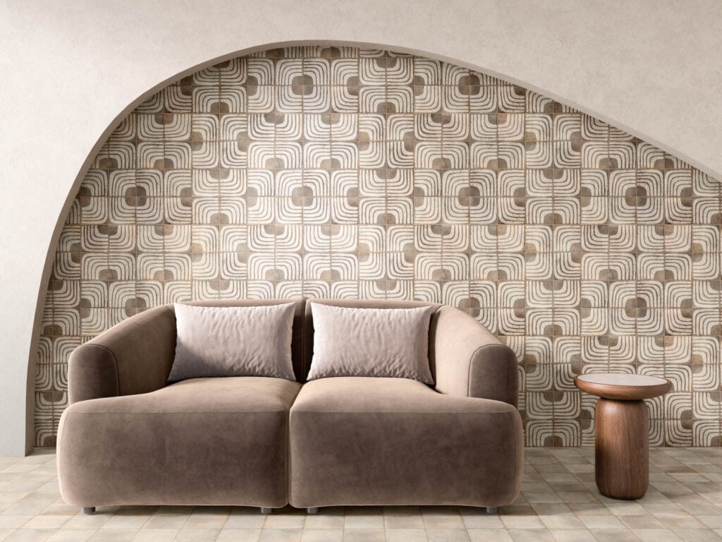 sofa coklat dekat dinding ubin