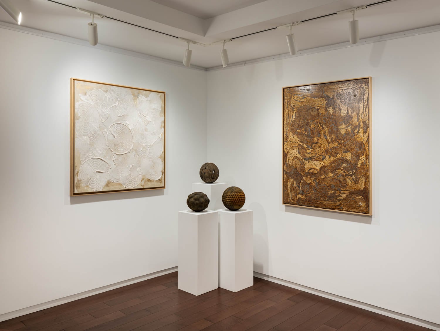 a gallery with art on walls