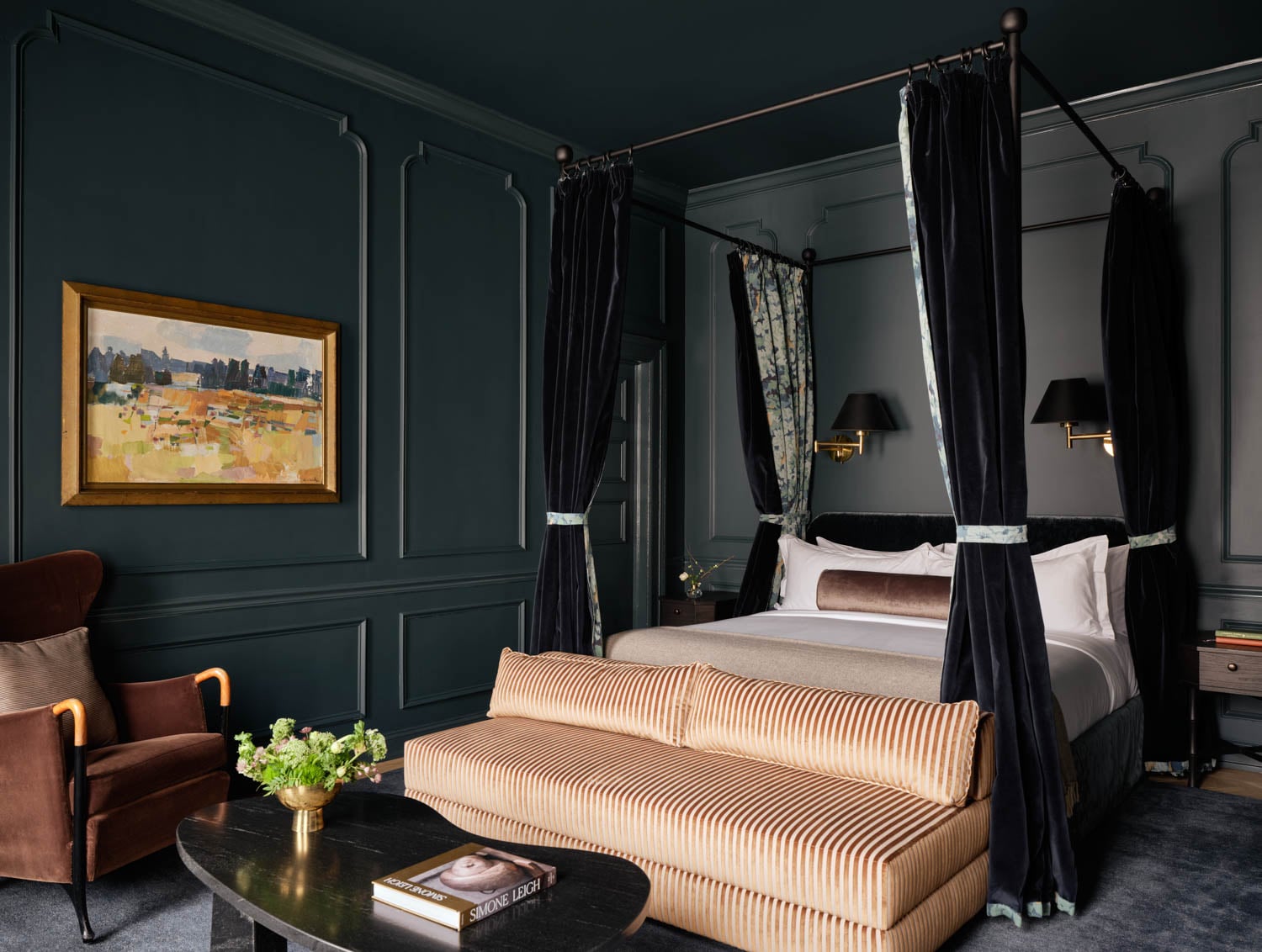 moody bedroom with canopy bed at the bellevue hotel