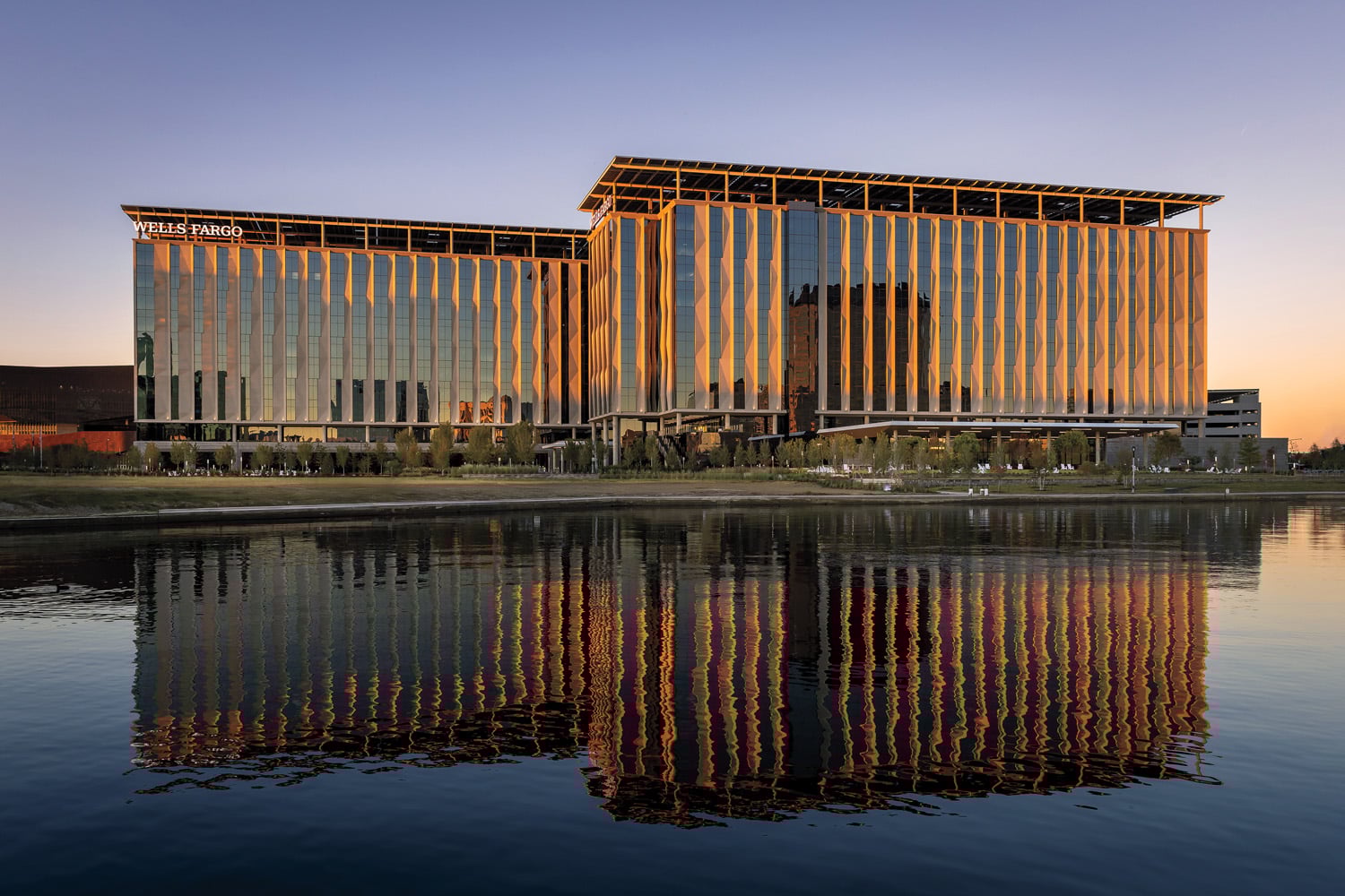 wells fargo facade reflecting on water