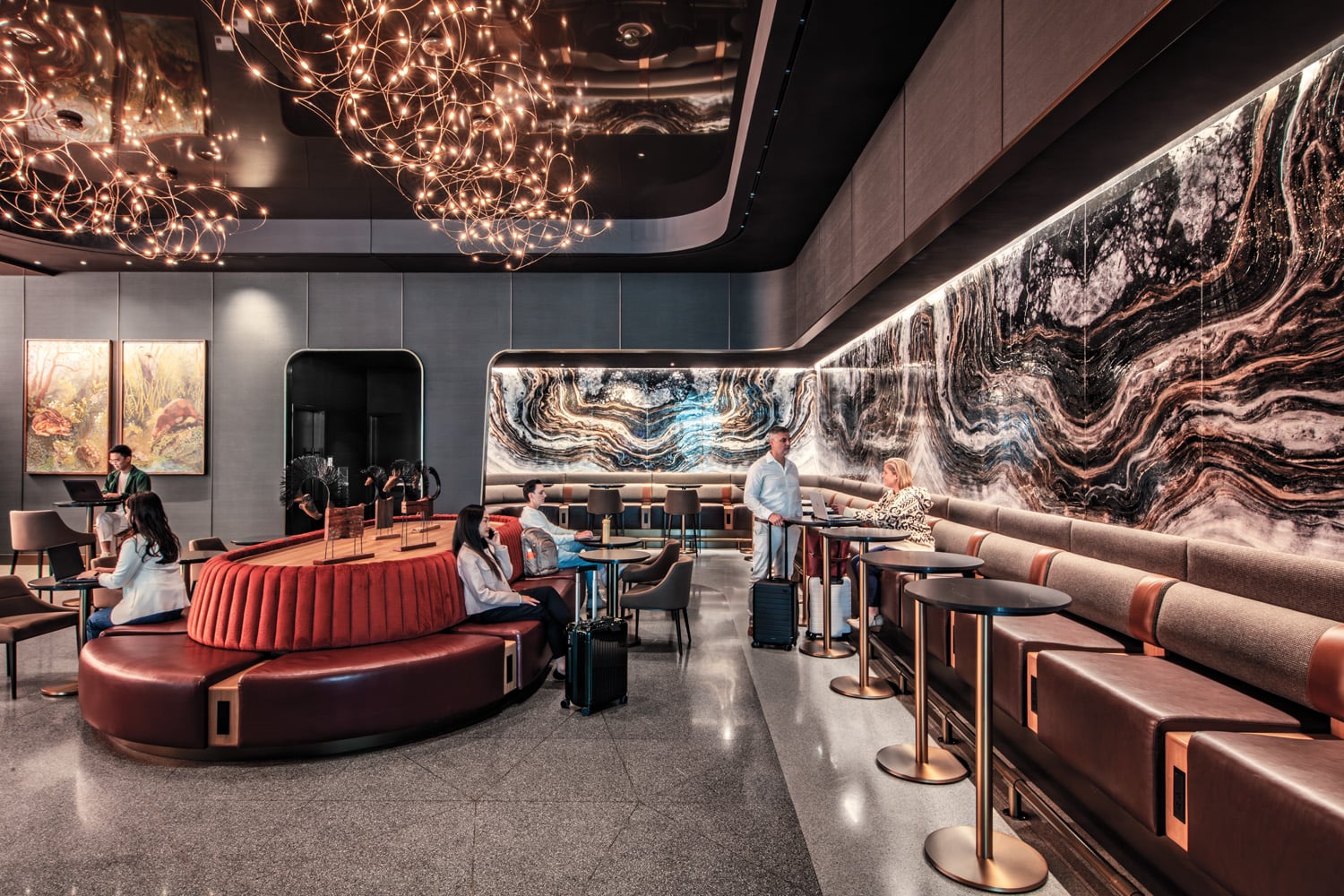 bar with red curved sofa