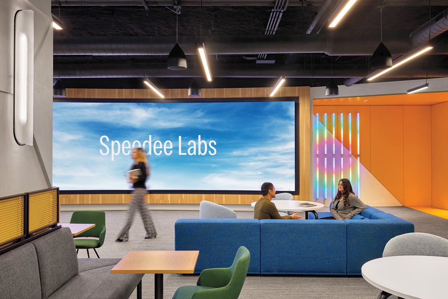 a curved digital screen that says speedee labs