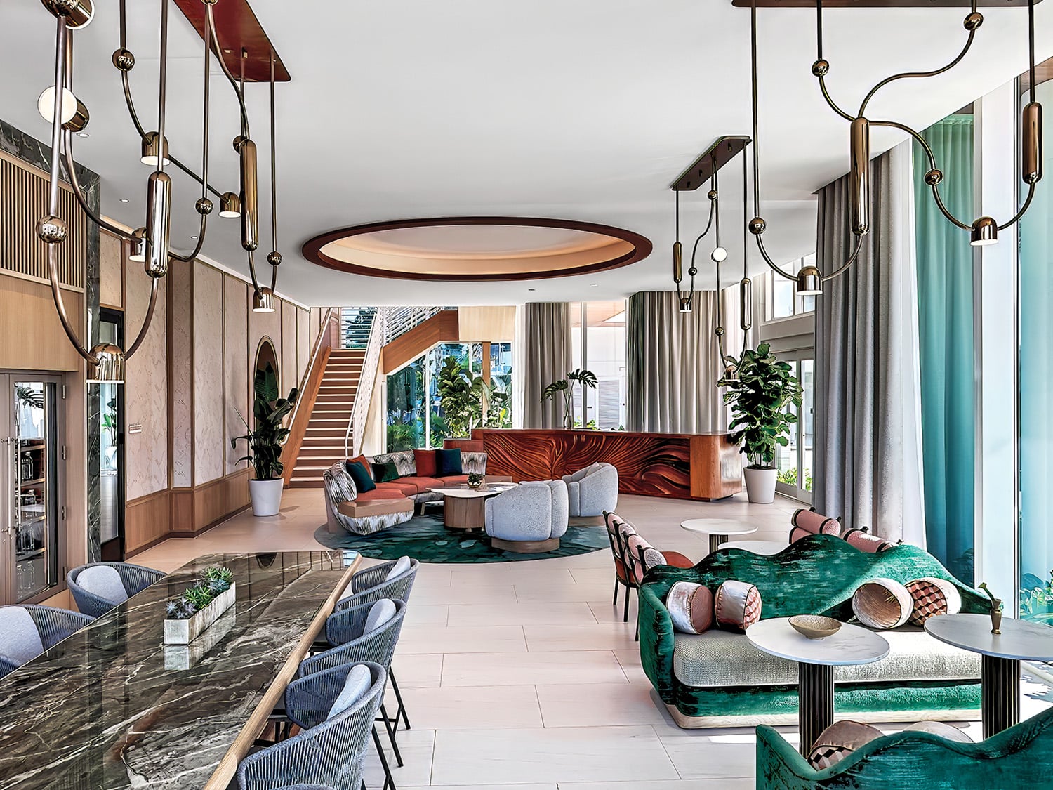 suite with dining table and staircase and lounge area