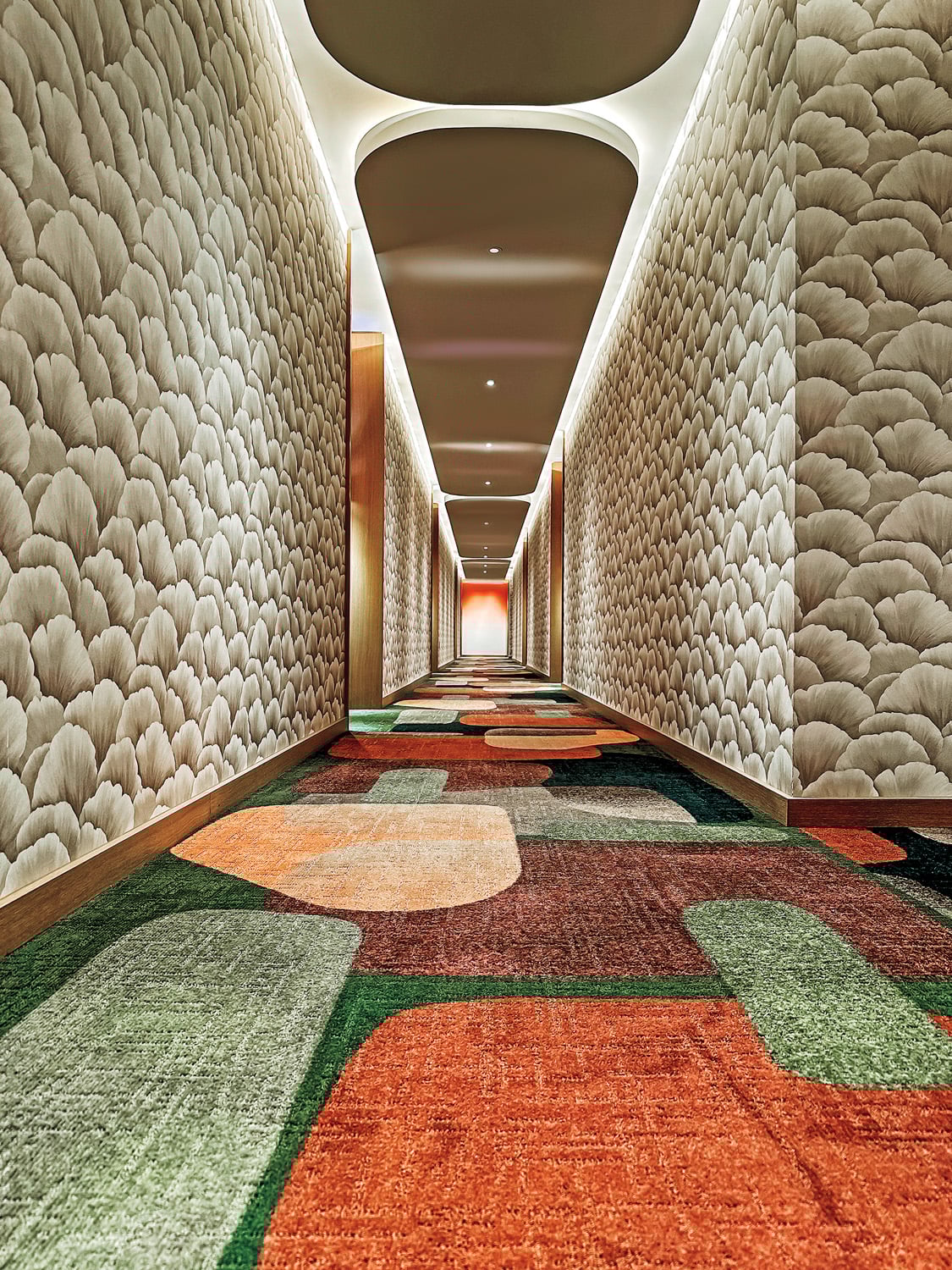 hallway with geometric carpet