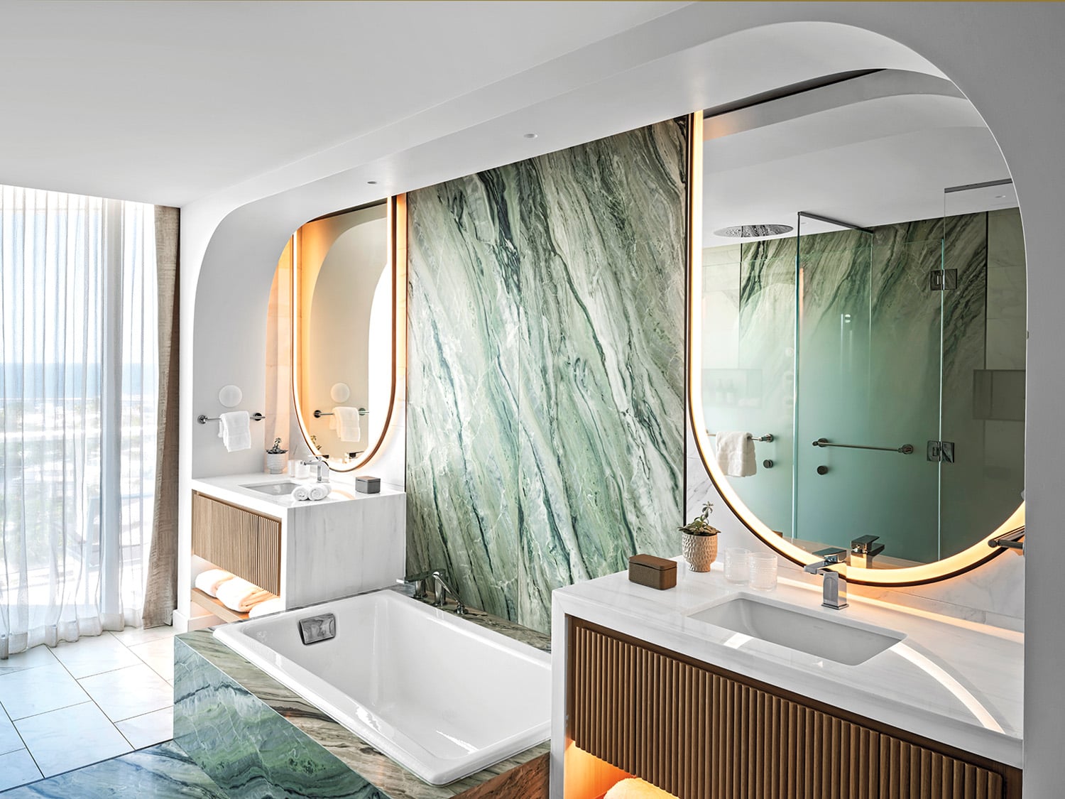 bathroom with green marble walls