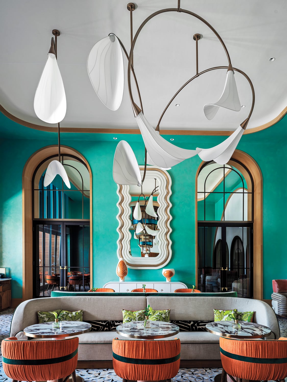 the Orchid Room is also top-to-bottom custom furnished, its archways lined in stained oak.